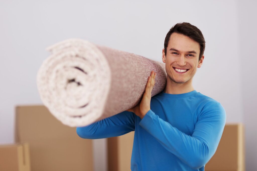 pose d'un tapis pour isoler le sol de la maison